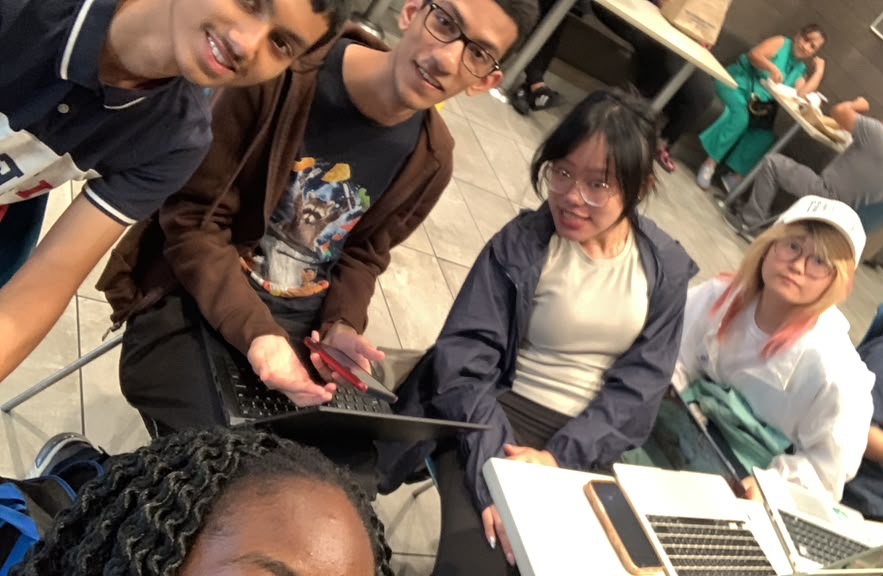 Smiling group of teen builders at the Queens meetup